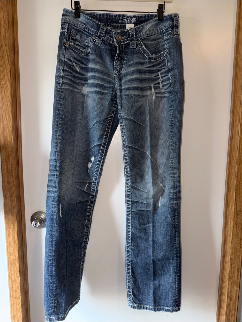 Silver Jeans Faded Blue Straight Leg Jeans with Distressed Detail